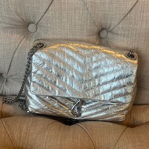 Rebecca Minkoff silver quilted crossbody bag.